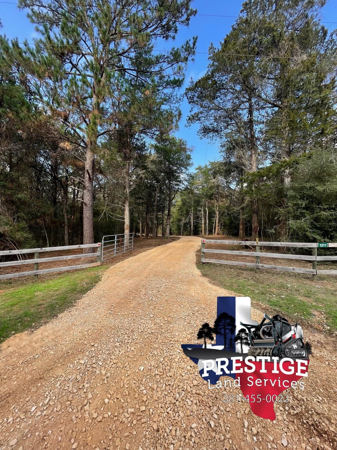 New gravel ranch road running through open pasture near Wallis, Texas